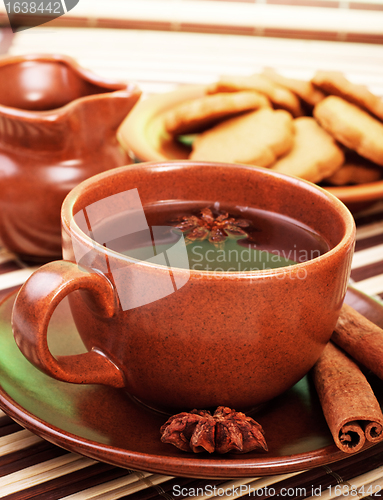 Image of tea with cinnamon sticks and star anise