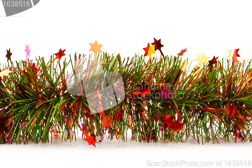 Image of christmas tinsel garland with stars