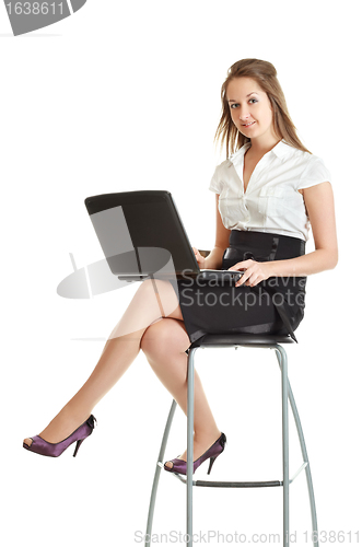 Image of Young Businesswoman With Laptop
