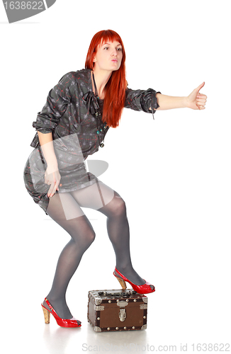 Image of Extravagant Woman Hitch-hiking