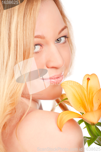 Image of Beautiful Young Woman With Lily Flower