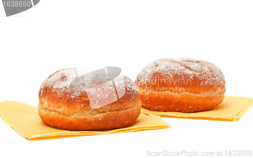 Image of two donuts in powdered sugar