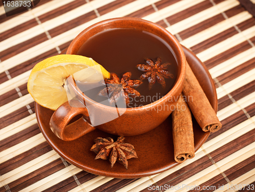 Image of tea with cinnamon sticks and star anise