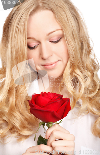 Image of Beautiful Young Woman With Red Rose