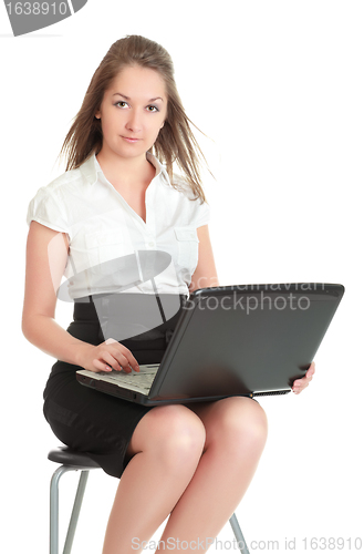 Image of Young Businesswoman With Laptop