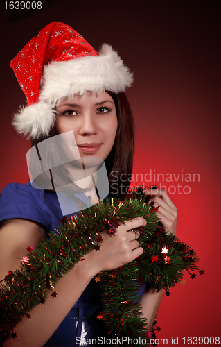 Image of christmas girl in santa hat