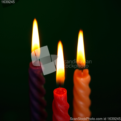Image of Three Candles On Black