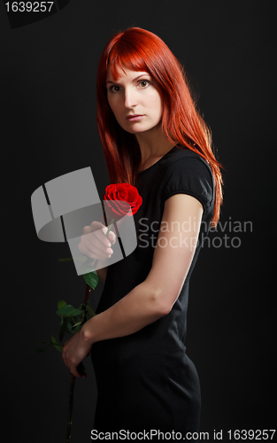 Image of Woman With Red Rose