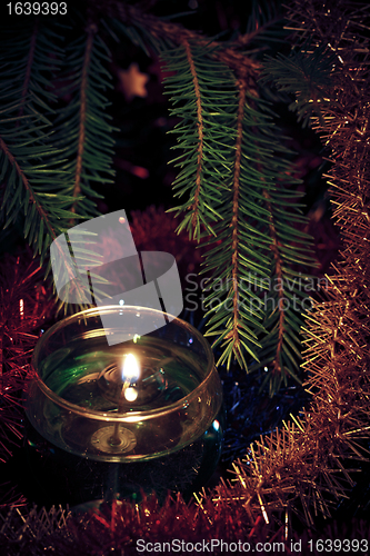 Image of candles and fir branches