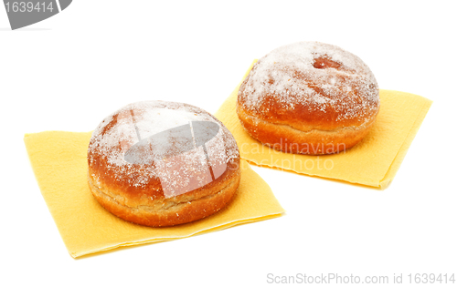 Image of two donuts in powdered sugar