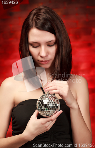 Image of girl with decoration ball