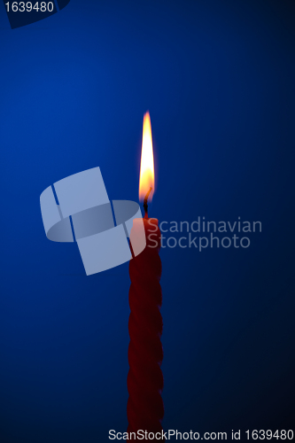 Image of Candle On Blue