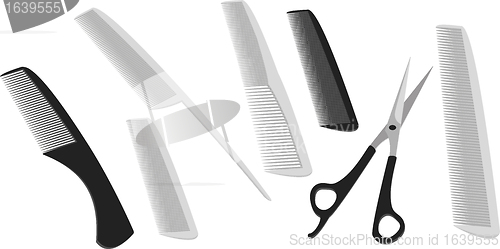 Image of Hairdressing scissors and a many comb
