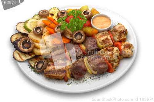 Image of assorted  kebab: veal, chicken and pork