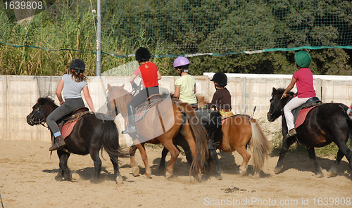 Image of riding children