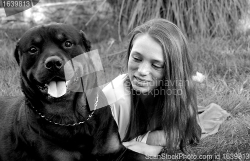 Image of girl and rottweiler