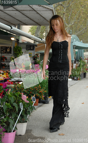 Image of young girl and florist shop