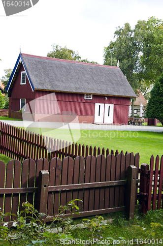 Image of country tourism house fence and tidy environment 