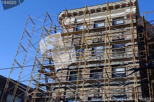 Image of Old building under construction surrounded by scaffolding