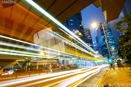 Image of futuristic urban city with car light