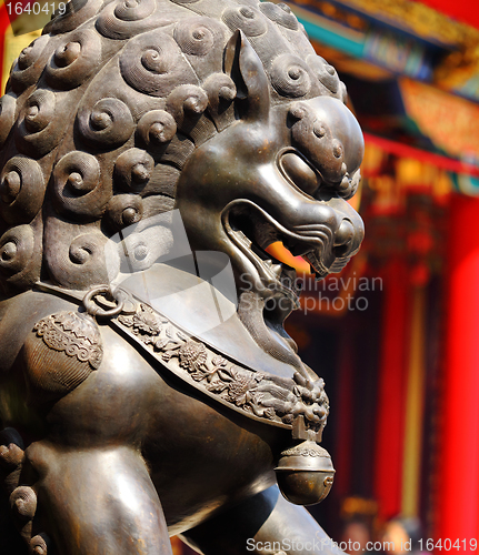 Image of Bronze lion in chinese temple