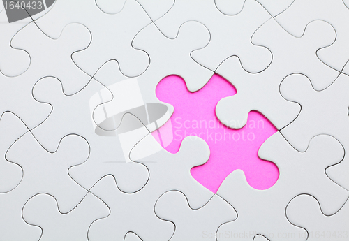 Image of puzzle with missing piece