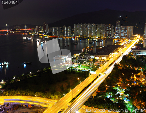 Image of urban with traffic at night