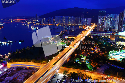 Image of highway system in city at night