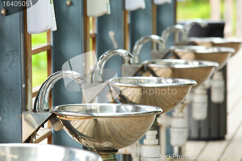 Image of sinks and taps in outdoor