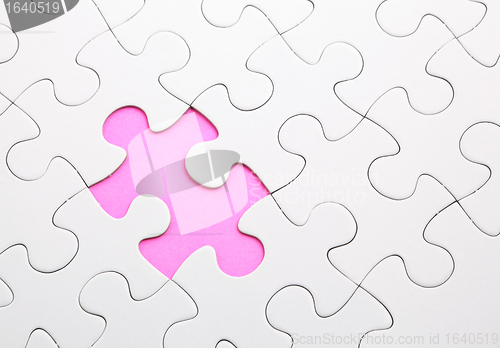 Image of puzzle with missing piece