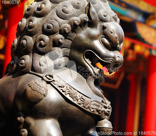 Image of metal lion in chinese temple