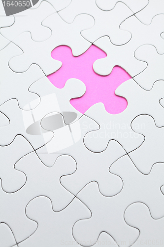 Image of puzzle with missing piece