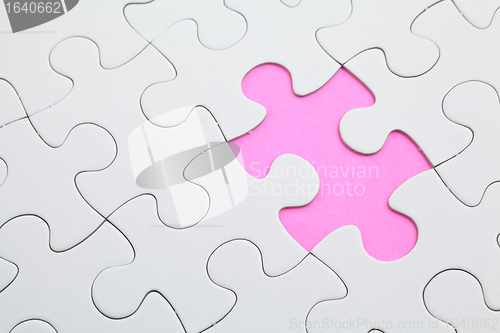 Image of puzzle with missing piece