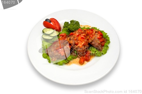 Image of grilled veal fillet with vegetable salad sauce