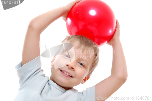 Image of active child  with a ball