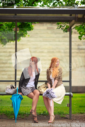 Image of Two Girls at Bus Stop