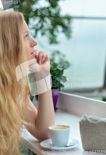 Image of Beautiful Girl in Cafe