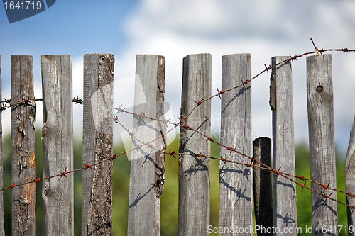 Image of Fence With Barbed Wire