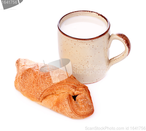 Image of Crispy Bun and Mug of Milk