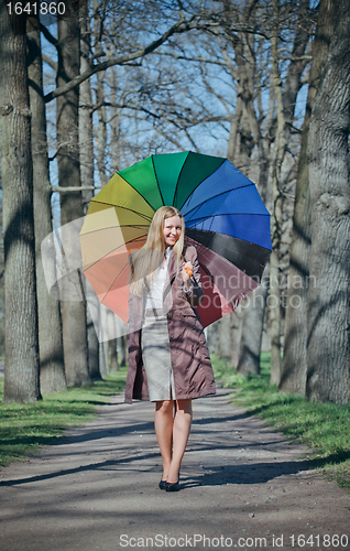 Image of Beautiful Woman with Umbrella