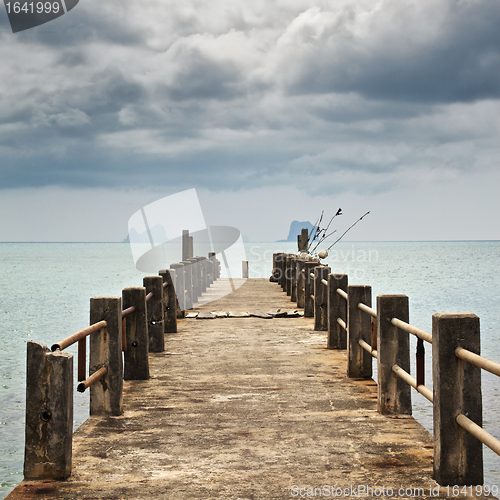 Image of Pier under Dark Clouds