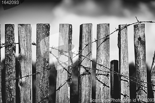 Image of Fence With Barbed Wire