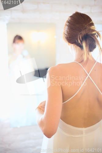 Image of Bride Before Mirror