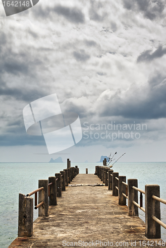 Image of Pier under Dark Clouds