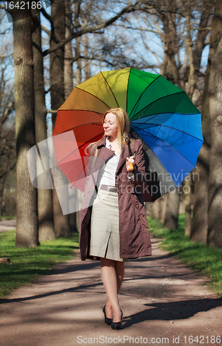 Image of Beautiful Woman with Umbrella