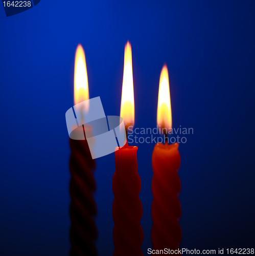 Image of Three Candles On Blue