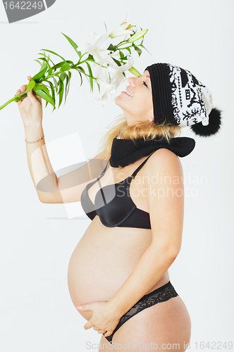 Image of Pregnant Woman with Flower