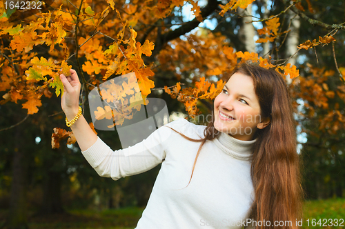 Image of Girl in Autumn Forest