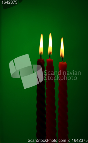 Image of Three Candles On Green