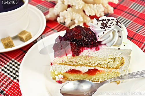 Image of Cake in a plate with coffee and coral